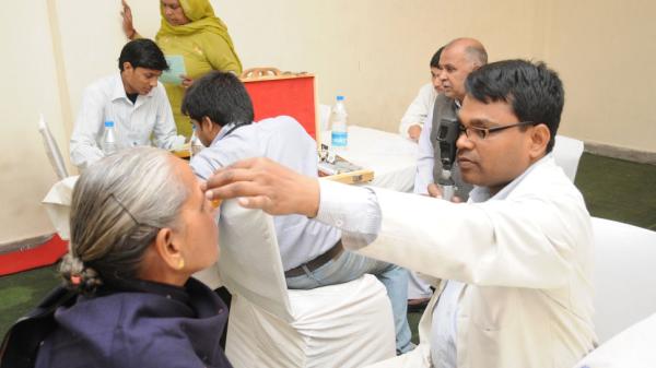 People receiving eye care as part of Sightsavers' Vision Delhi program